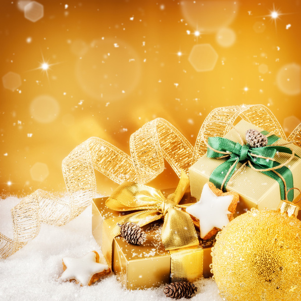 Christmas ornaments and gifts in golden tone - Photo, Image