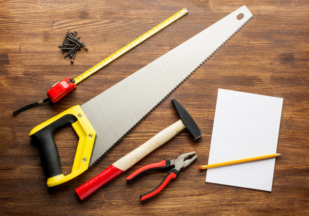 joinery tools on wood table background with note book and copy space - 写真・画像