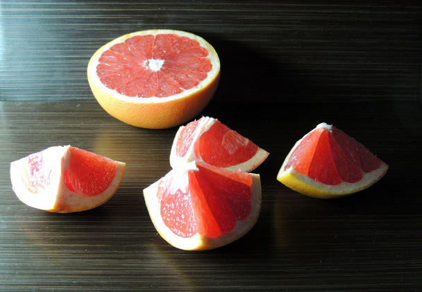 Grapefruit on wooden background  - Photo, Image