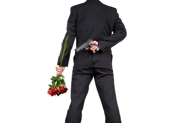 Aziatische zakenman permanent met een bedrijf een boeket van Rose bloem - Foto, afbeelding