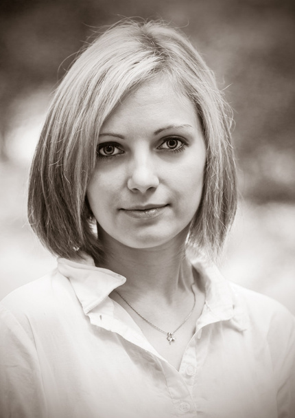 Portrait of a cute blonde. Sepia - Valokuva, kuva