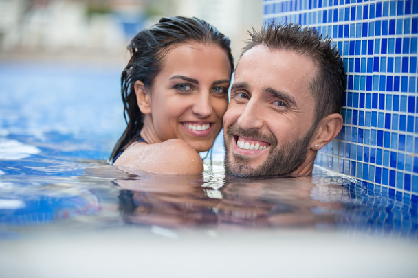 Couple in the pool - Фото, зображення