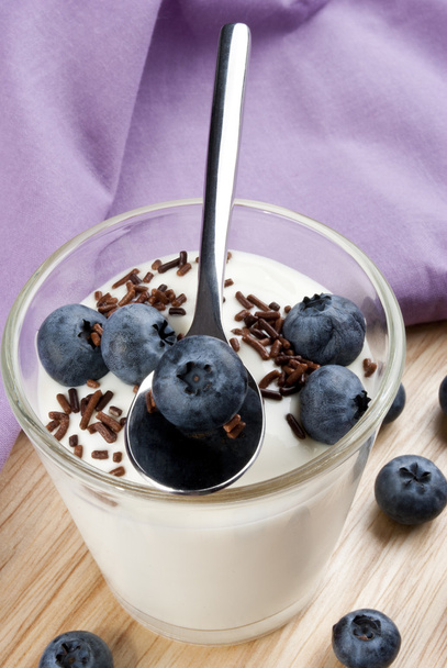 Blueberries with fresh yogurt and chocolate sprinkles - Photo, Image