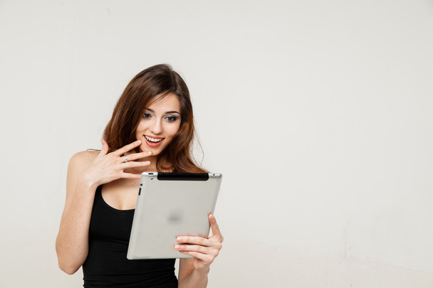 young woman holding tablet pc biute - 写真・画像
