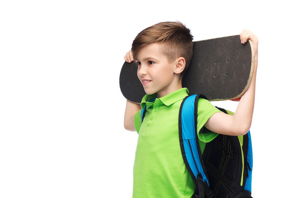 happy student boy with backpack and skateboard - Fotoğraf, Görsel