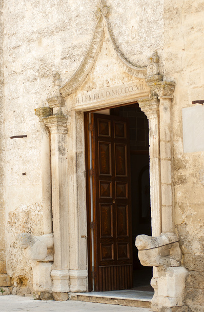Detail deur hoofdingang moederkerk. Mottola - Foto, afbeelding