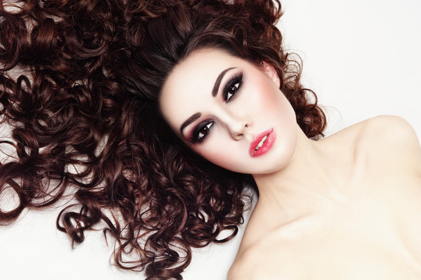 beautiful woman with curly hair - Zdjęcie, obraz