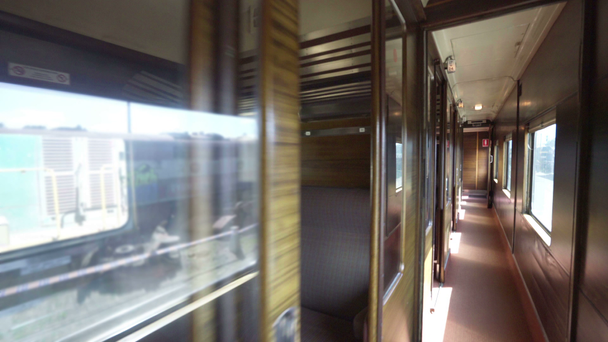 Walking inside train compartment - Materiał filmowy, wideo