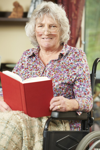 Senior Woman In Wheelchair Reading Book - Fotó, kép