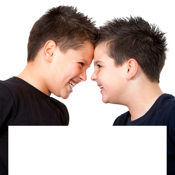 Portrait of boys facing each other behind copyspace - Foto, Imagem