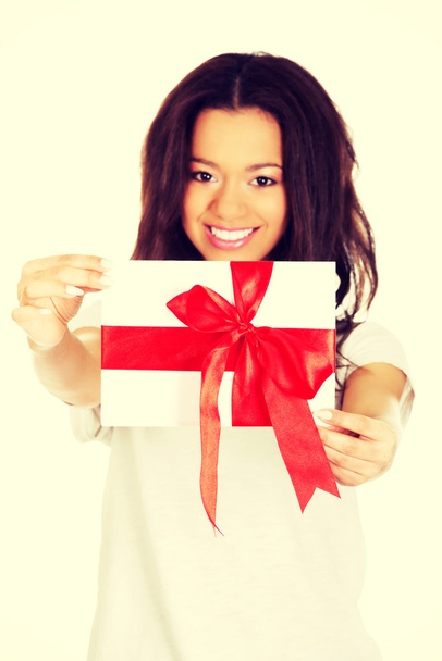 Young woman with present - Foto, Imagem
