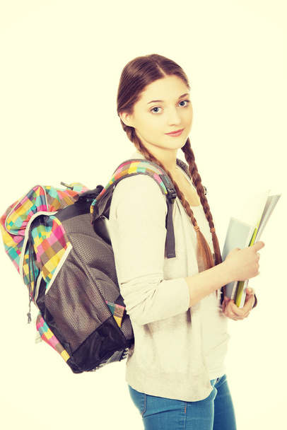 Teenager girl with school backpack. - Foto, Imagen