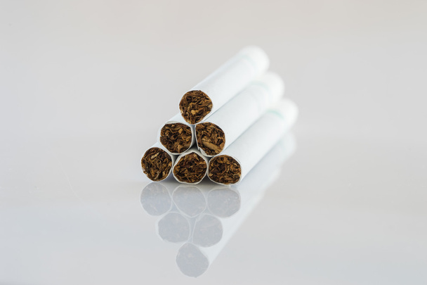 close up set of cigarettes on white background - Photo, image