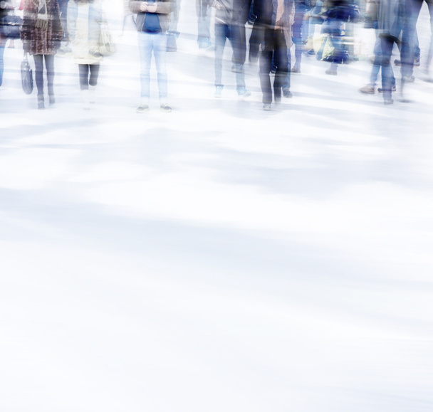 abstract photo of people in motion. Blurred people walking through a city street - Photo, Image