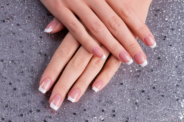 Manicure on a silver background. - Photo, Image
