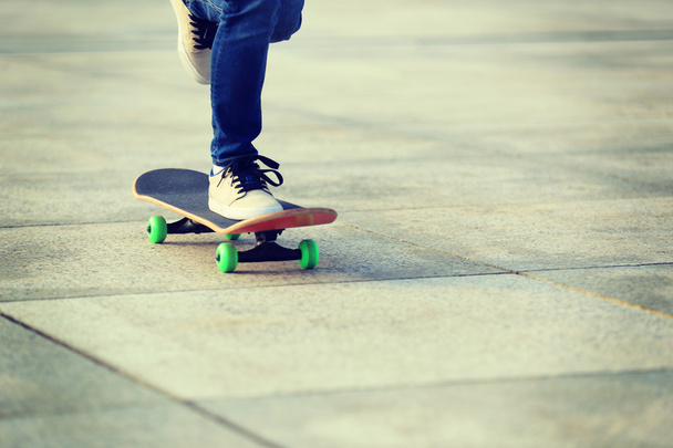 female skateboarder skateboarding - 写真・画像