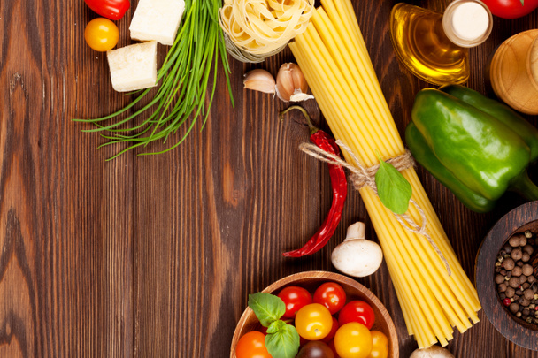cooking ingredients. Pasta, vegetables, spices - Zdjęcie, obraz