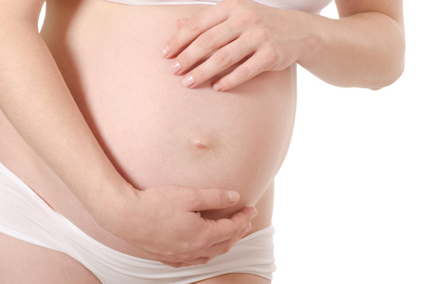 Pregnant woman with beautiful belly - Фото, зображення