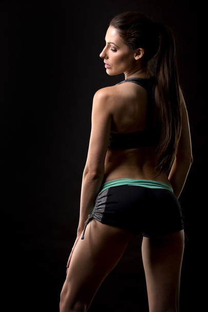 fitness woman on black background - Фото, изображение