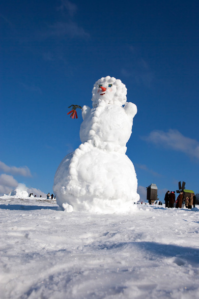 A háttérégbolt nagy hóember - Fotó, kép