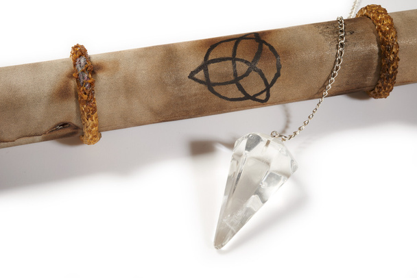 Old parchment with crystal pendulum - Photo, Image
