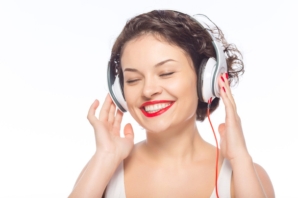 Young attractive woman wearing headphones. - Фото, зображення