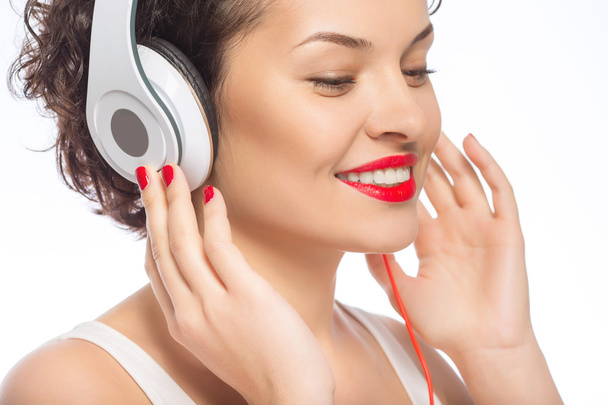 Young attractive woman in headphones. - Zdjęcie, obraz