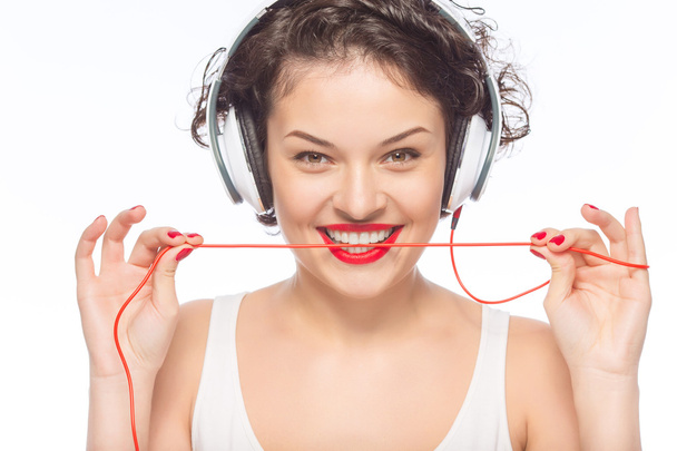Young attractive woman wearing headphones. - 写真・画像