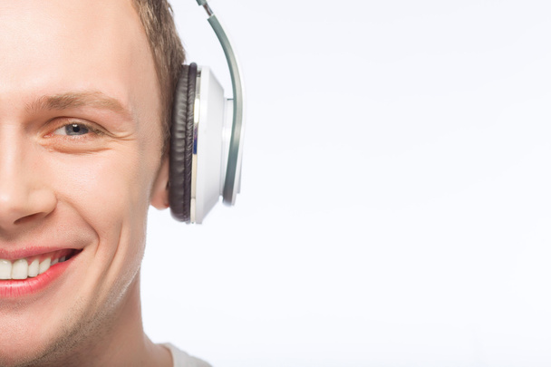 Young guy wearing headphones - Φωτογραφία, εικόνα