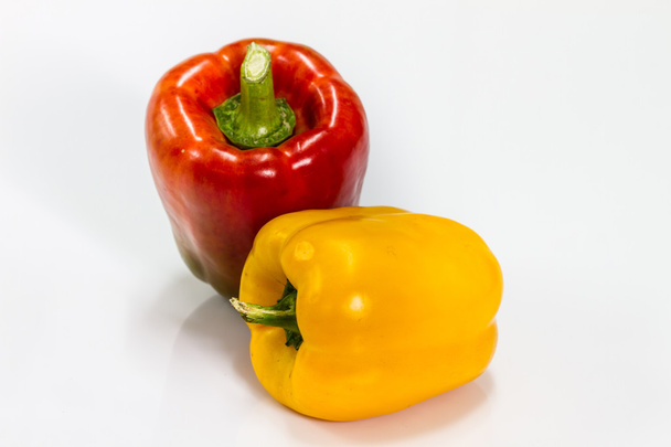 colored peppers over white background - Photo, Image