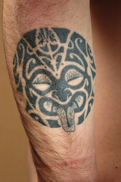 Племінне татуювання на руці
 - Фото, зображення