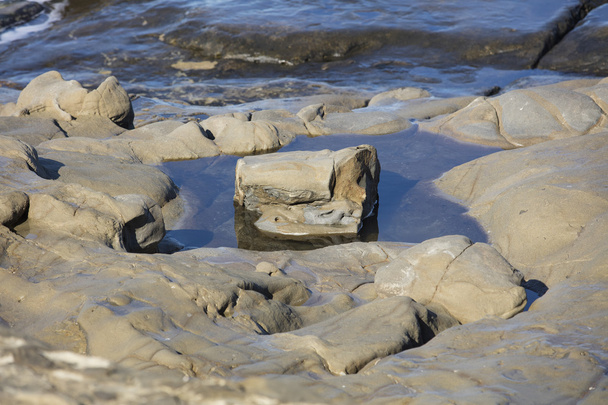 Solitary Rock In Pool of Water and Reflection at La Jolla Califo - Photo, Image