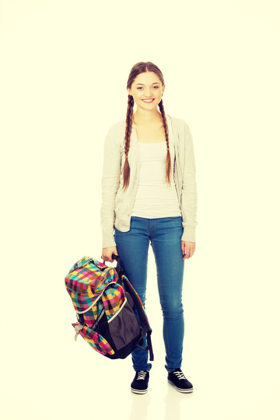 Happy teen woman with backpack. - Valokuva, kuva