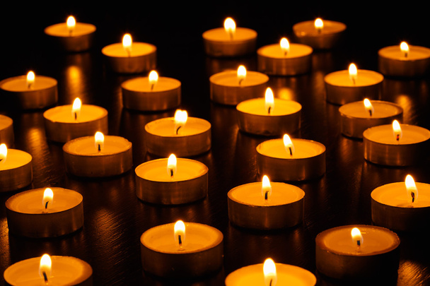 Many burning candles - Фото, зображення