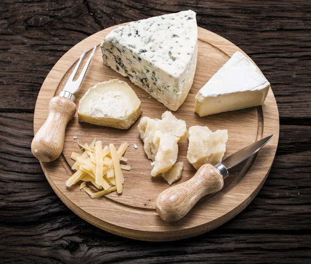 Variety of cheeses. Vintage stiles. - Fotoğraf, Görsel