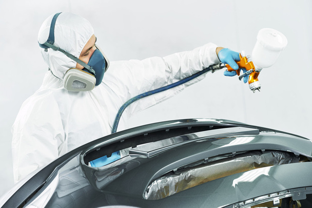 worker painting auto car bumper - Φωτογραφία, εικόνα