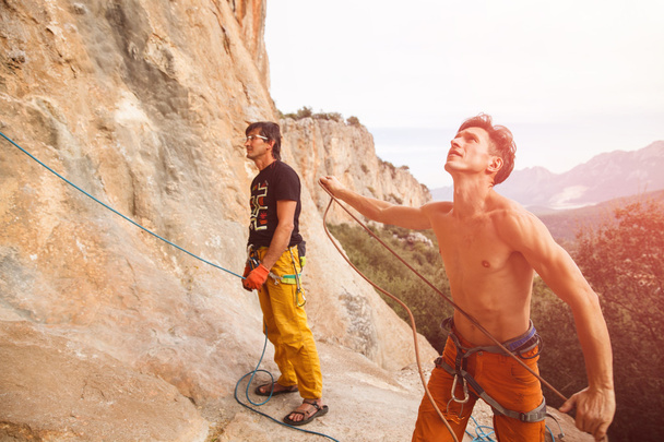 Two rock climbers on the cliff - Photo, Image