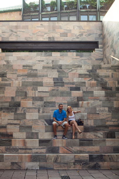 Couple sitting on staircase - Photo, image