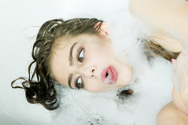 Playful woman in bath - Φωτογραφία, εικόνα