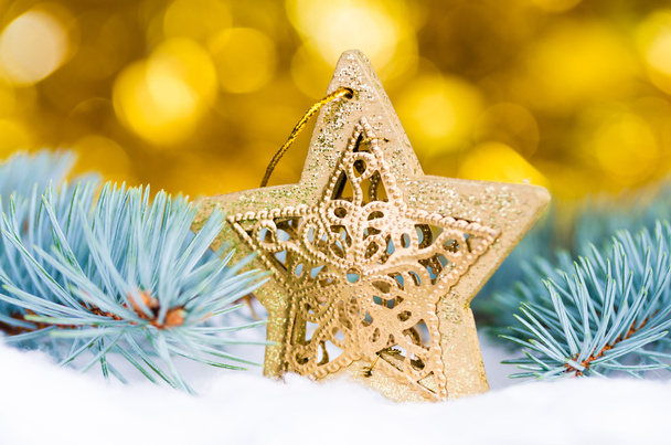 Estrella dorada de Navidad
 - Foto, Imagen