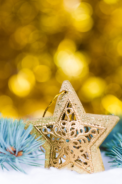 Estrella dorada de Navidad
 - Foto, Imagen