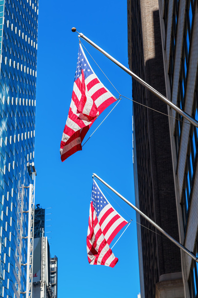 US flags at skyscrapers in Manhattan, NYC - Fotografie, Obrázek