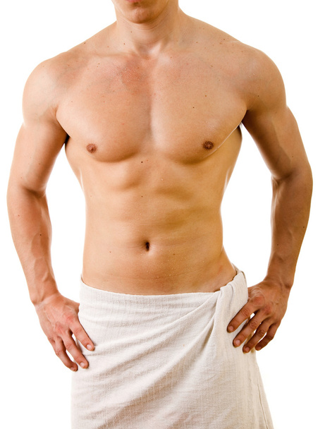 Wet muscular sexy man wrapped in the towel, isolated on white - Valokuva, kuva