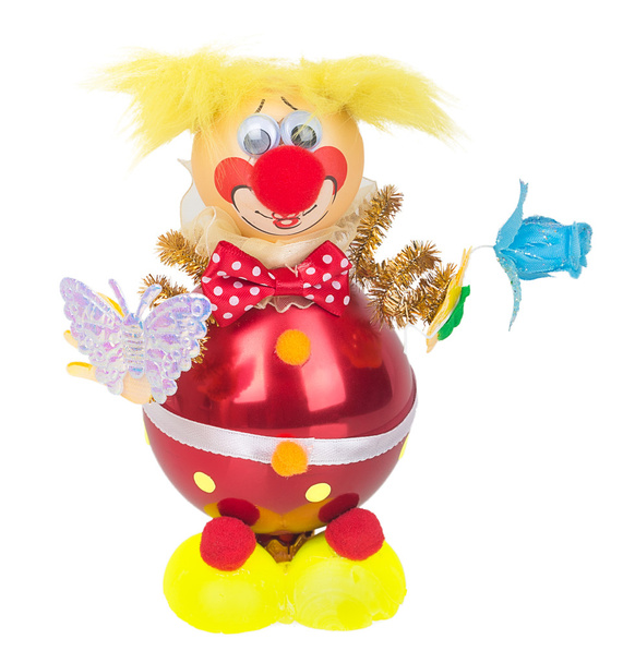 Игрушечный клоун с бабочкой и цветок в руках украшения
 - Фото, изображение