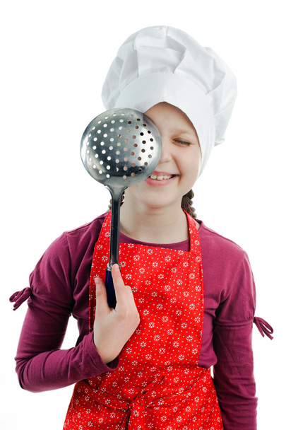 A girl with a colander in her hands - Foto, immagini