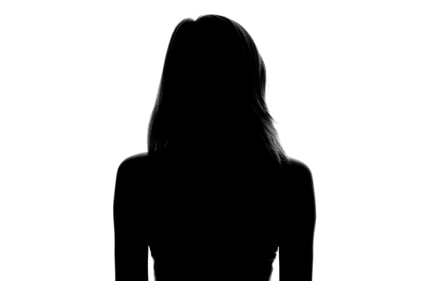 silhouette of a woman's face on a white background - Фото, изображение