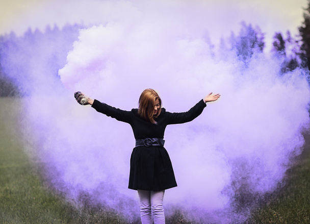 young girl in colored smoke - Photo, Image