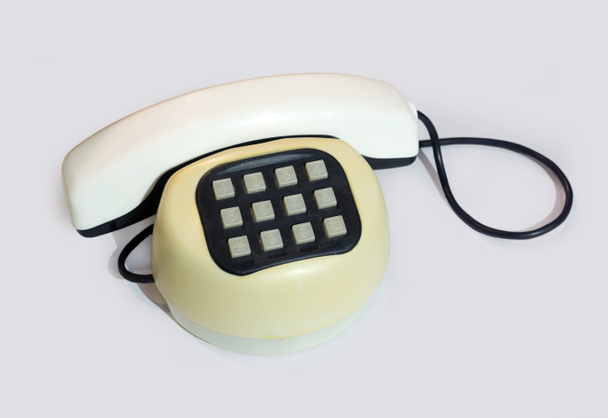 Vieux téléphone à bouton-poussoir en plastique
 . - Photo, image