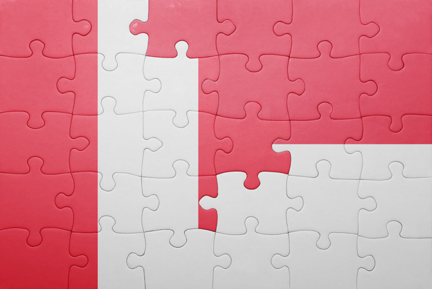 puzzle with the national flag of indonesia and peru - Foto, afbeelding