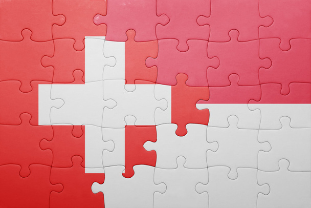 puzzle s národní vlajka Indonésie a ve Švýcarsku - Fotografie, Obrázek